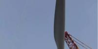 国内首台2MW 120m桁架塔架风电机组吊装成功(附现场图集)